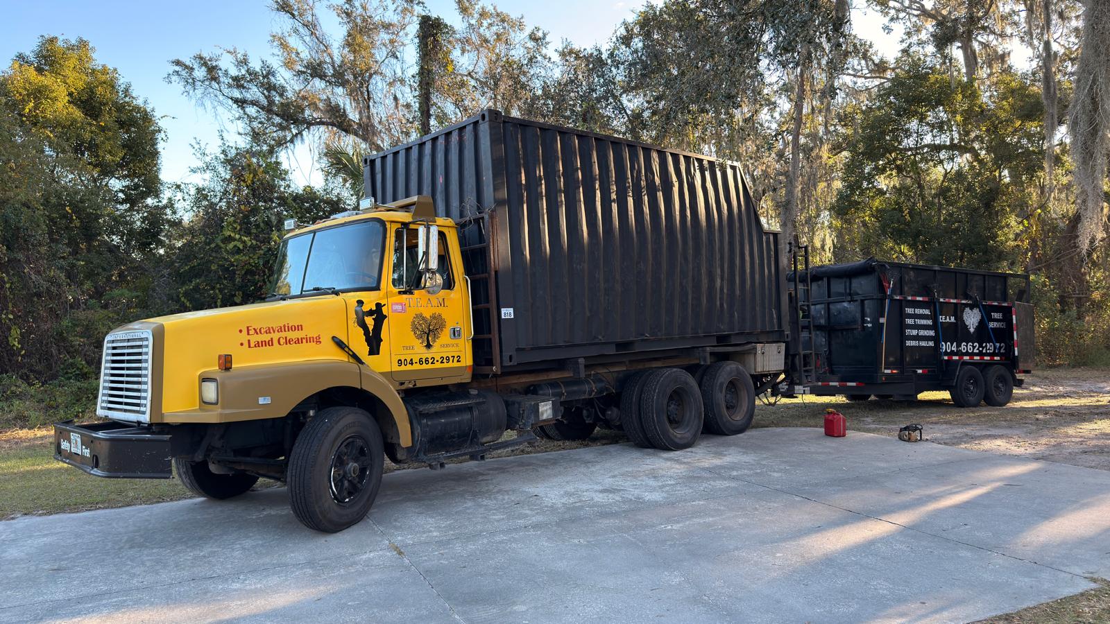 T.E.A.M. Tree Service debris hauling equipment